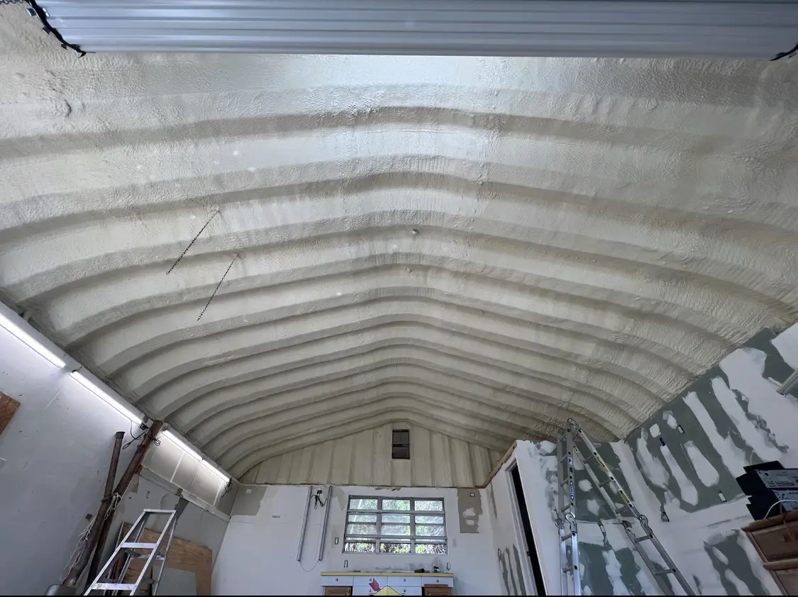 Spray polyurethane foam applied to the underside of a metal roof deck in Bedminster